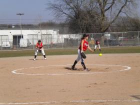 Willow Run junior starting pitcher Katie Mullins in the third inning in the team's home-opener against Huron Valley Lutheran High School. Flyers lost 13-4 against the Hawks Tuesday.