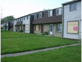 Many of the homes in the Liberty Square complex on Grove Street in Ypsilanti Township are already boarded and ready for foreclosure sale. All 151 units, some of which are still occupied, will be condemned Tuesday, Ypsilanti Township has resolved.
